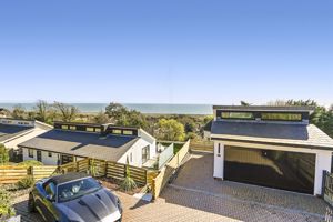front of property with garage and Jag- click for photo gallery